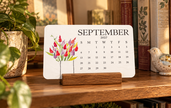 Seed calendar displayed on a bookshelf